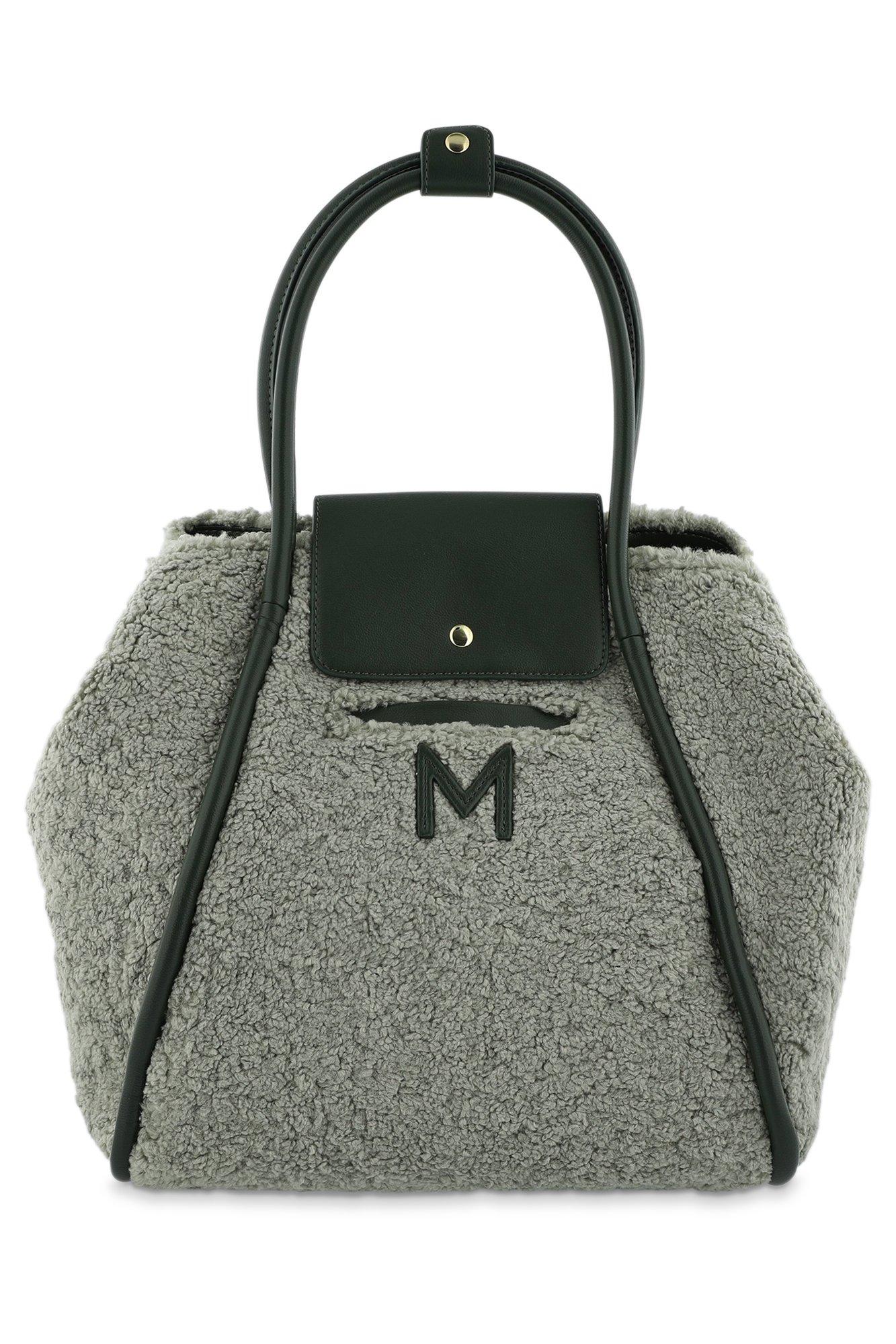 Grote shopper in teddy may Mayerline Brussels Belgie