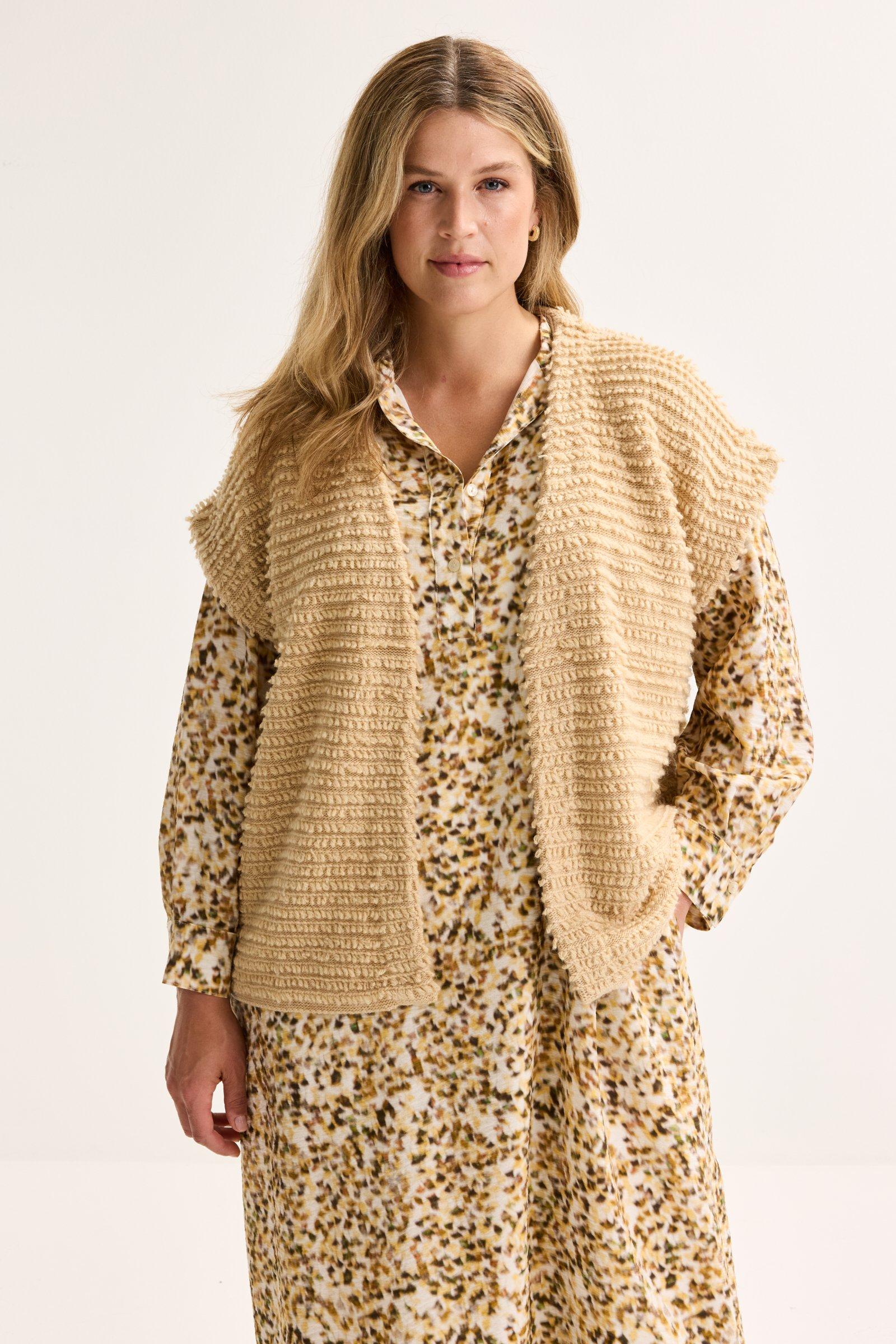 Gebreid vest met korte franjes