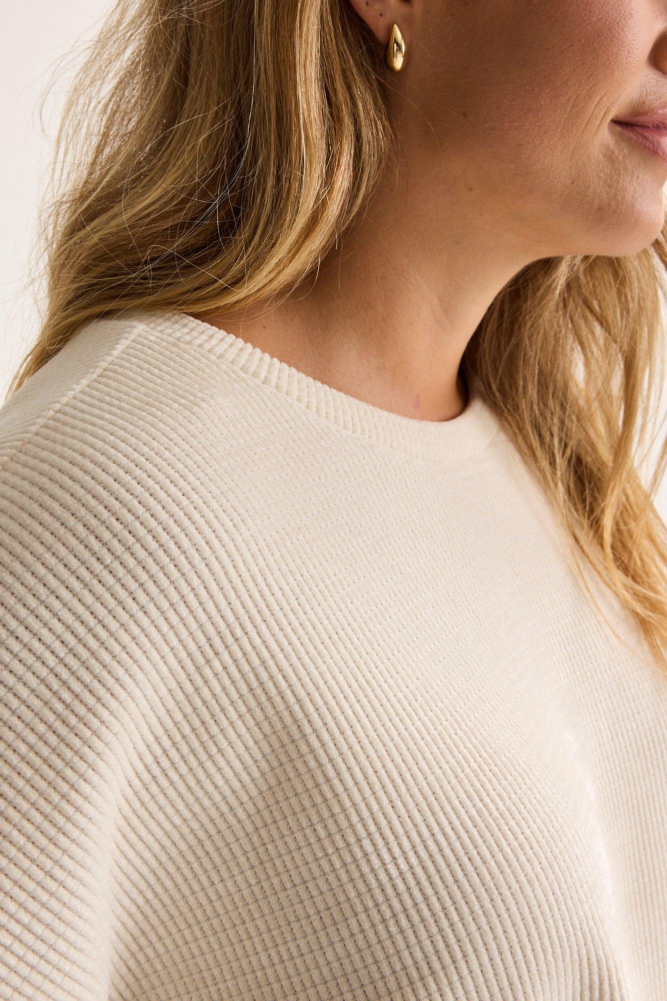 Hemden - Vleermuisblouse in chenille met seersuckerstructuur