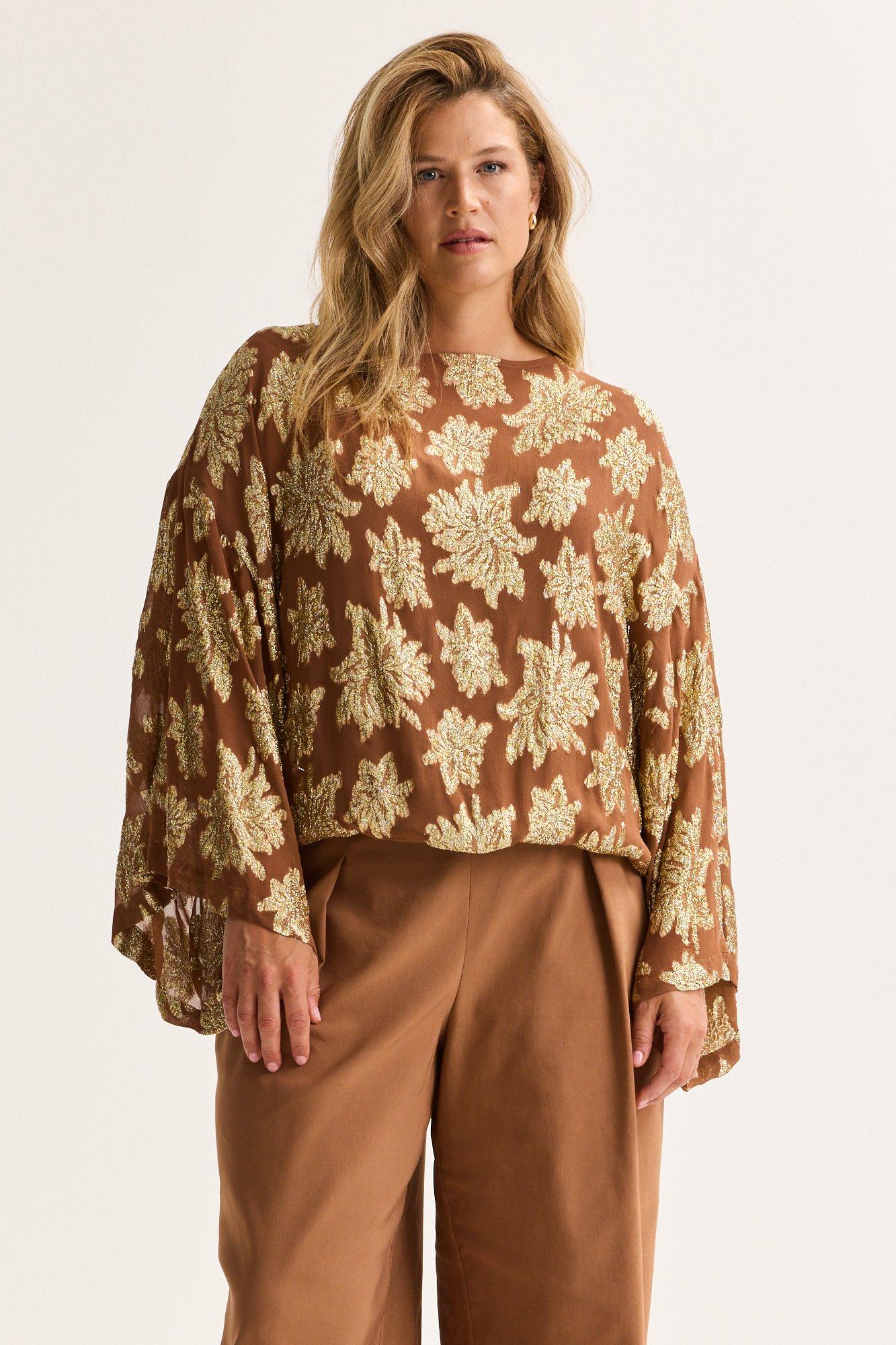 Blouse in voile met gouddraad