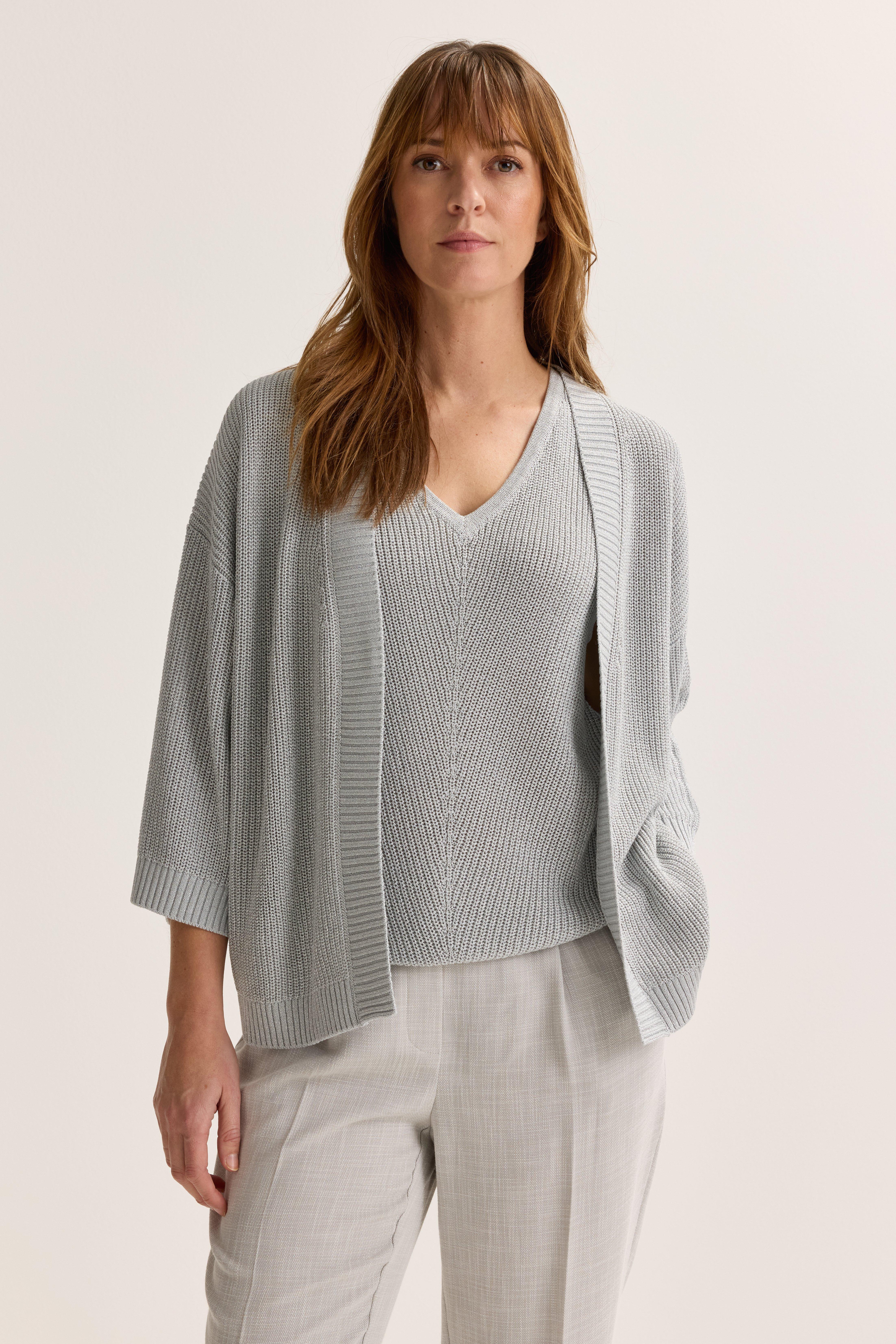 Cardigan &eacute;vas&eacute; avec lurex