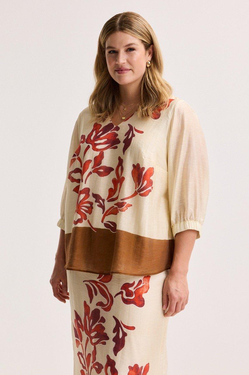 V-halsblouse in voile